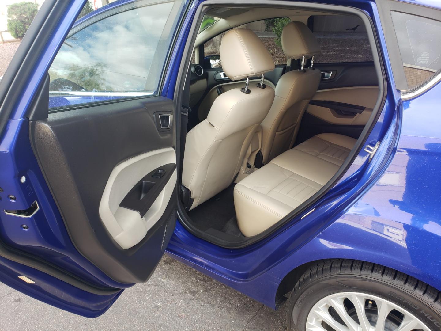 2014 /Tan and black Ford Fiesta Titanium (3FADP4FJ5EM) with an 1.6l i4 engine, 6-Speed Automatic transmission, located at 323 E Dunlap Ave., Phoenix, AZ, 85020, (602) 331-9000, 33.567677, -112.069000 - 2014 Ford Fiesta Titanium,.......A Must See!!... No accidents, Only 95K MILES.... Ice cold AC. The car is gorgeous inside and out. Power windows, Power door locks, Touch screen Stereo/ CD Player, Phone sync, Bluetooth, Satellite compatible, Backup camera, Beautiful tan and black interior with tan le - Photo#10